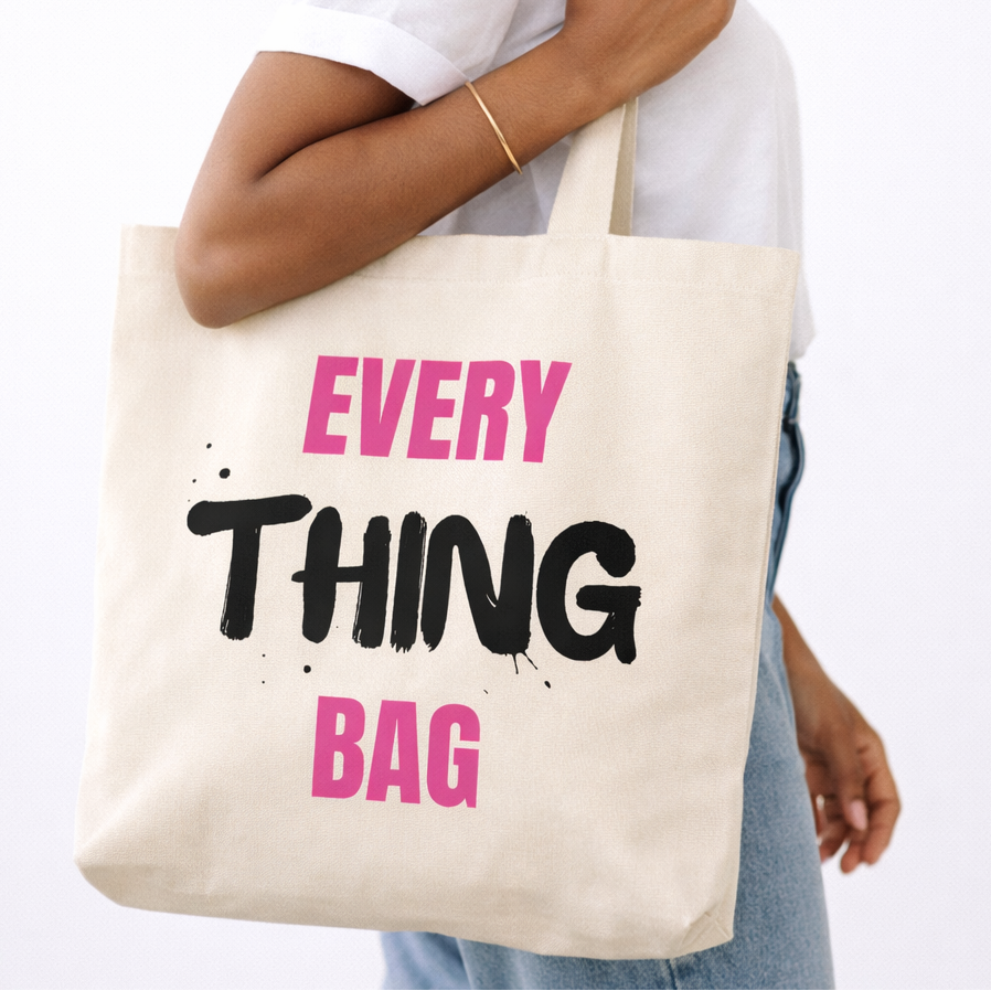 Person holding a tote bag with 'Every Thing Bag' text
